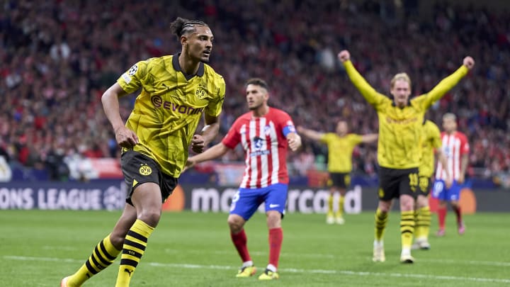 Borussia Dortmund lose to Atletico Madrid but Sebastien Haller's late goal  gives hope